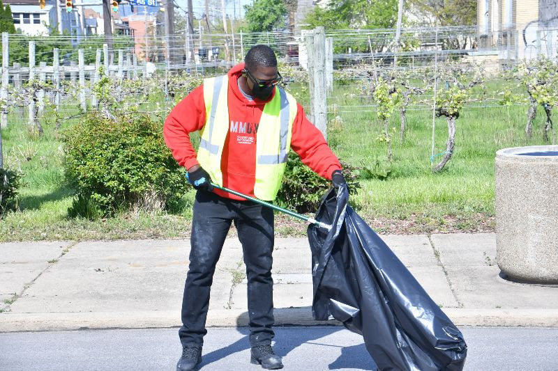 Man picking up trash