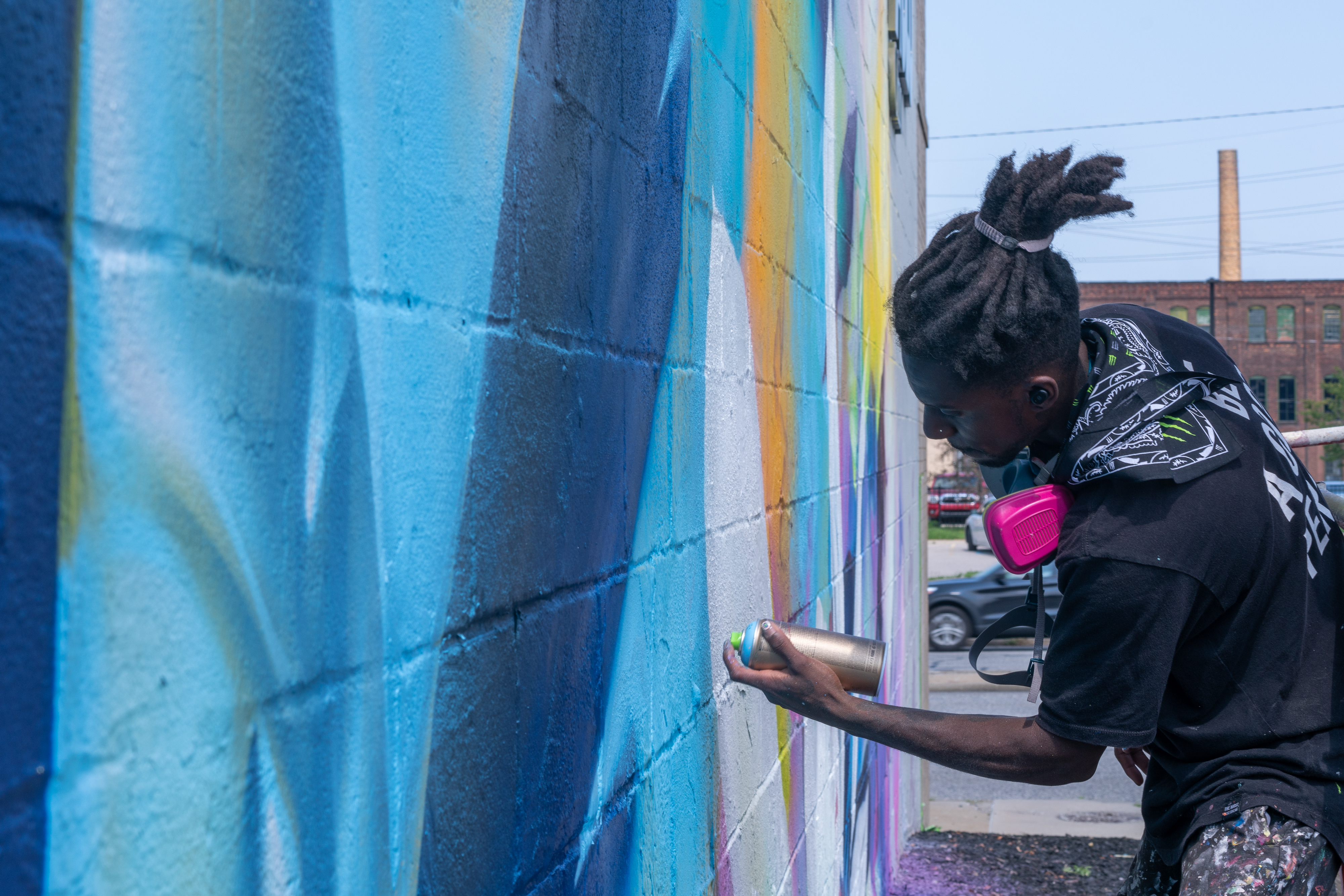 Artist Hiero creating mural