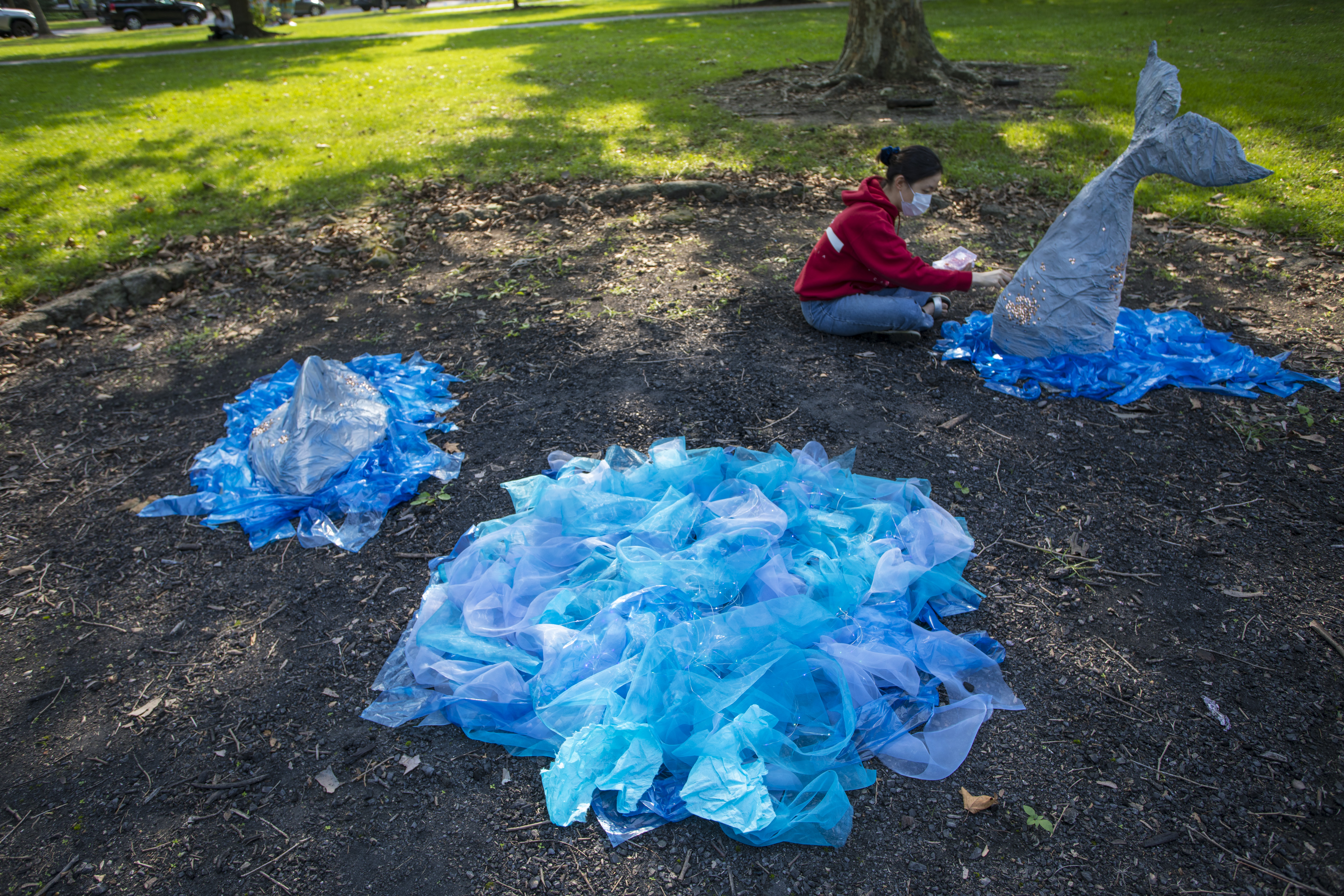 Jenna Ko works on an art installation. by Yvonne Gay.jpg