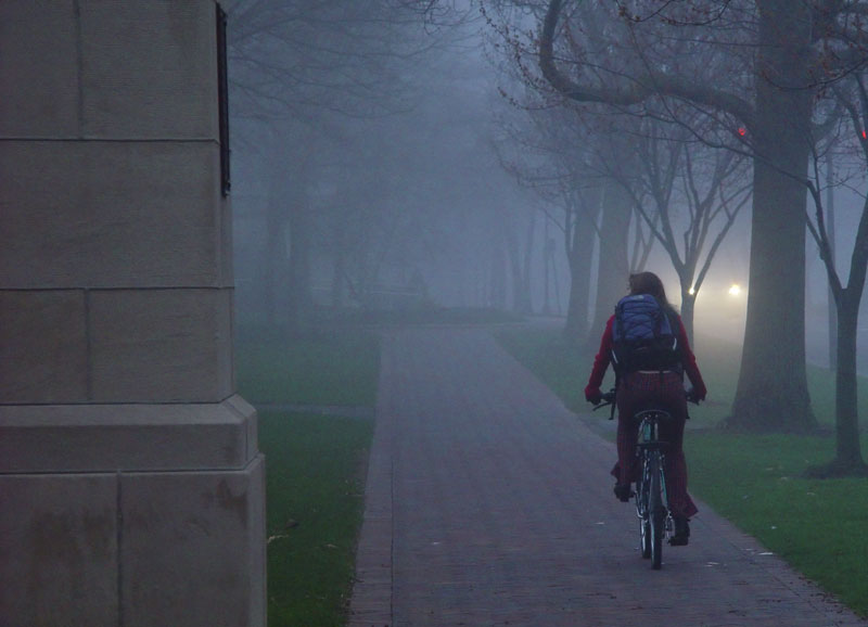 Bicyclist on Tappan Square in the fog
