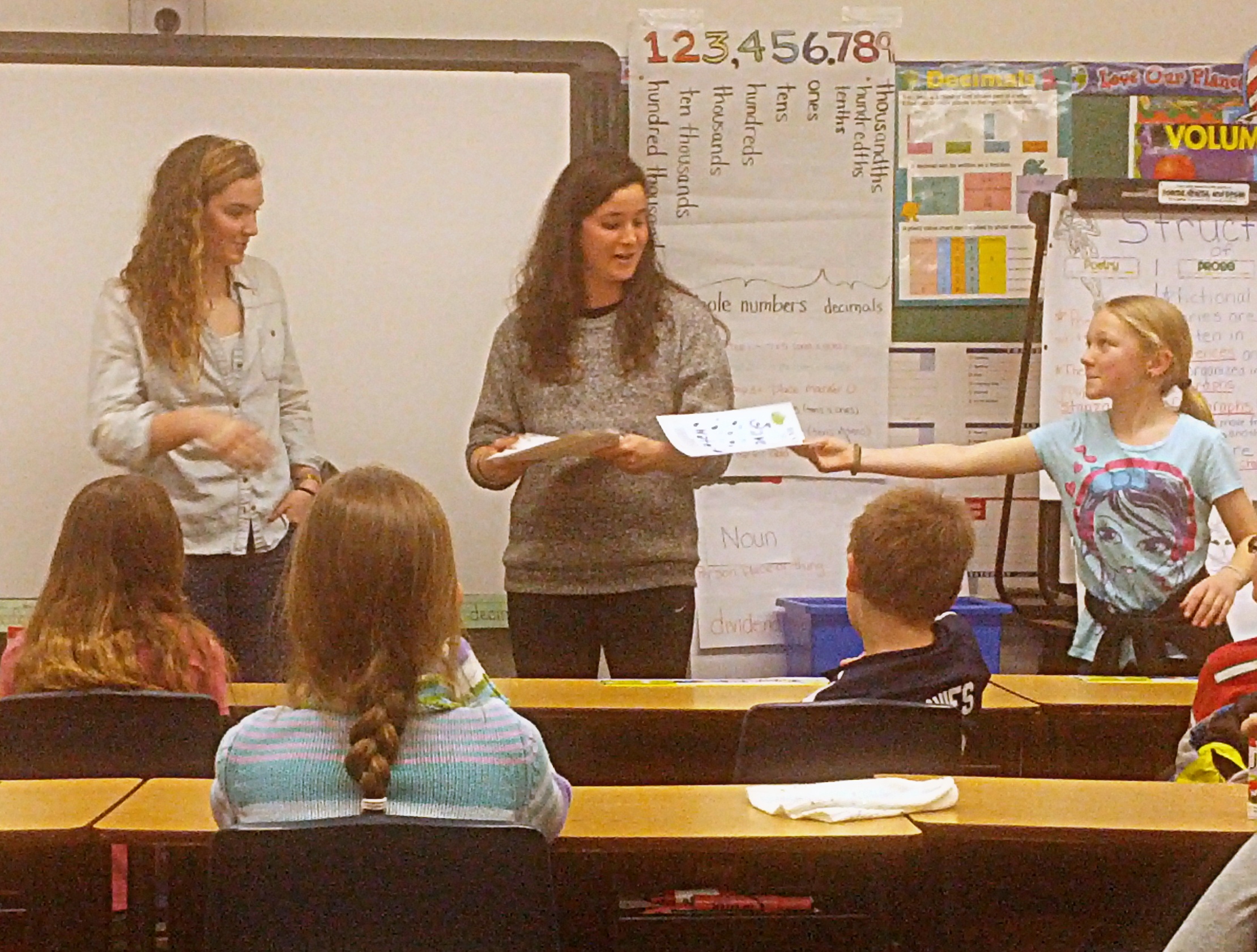 Miriam and Sydney Teaching About Ecolympics