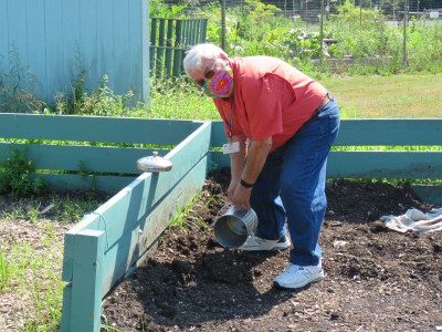 James Leo Walsh Composting Outside.JPG